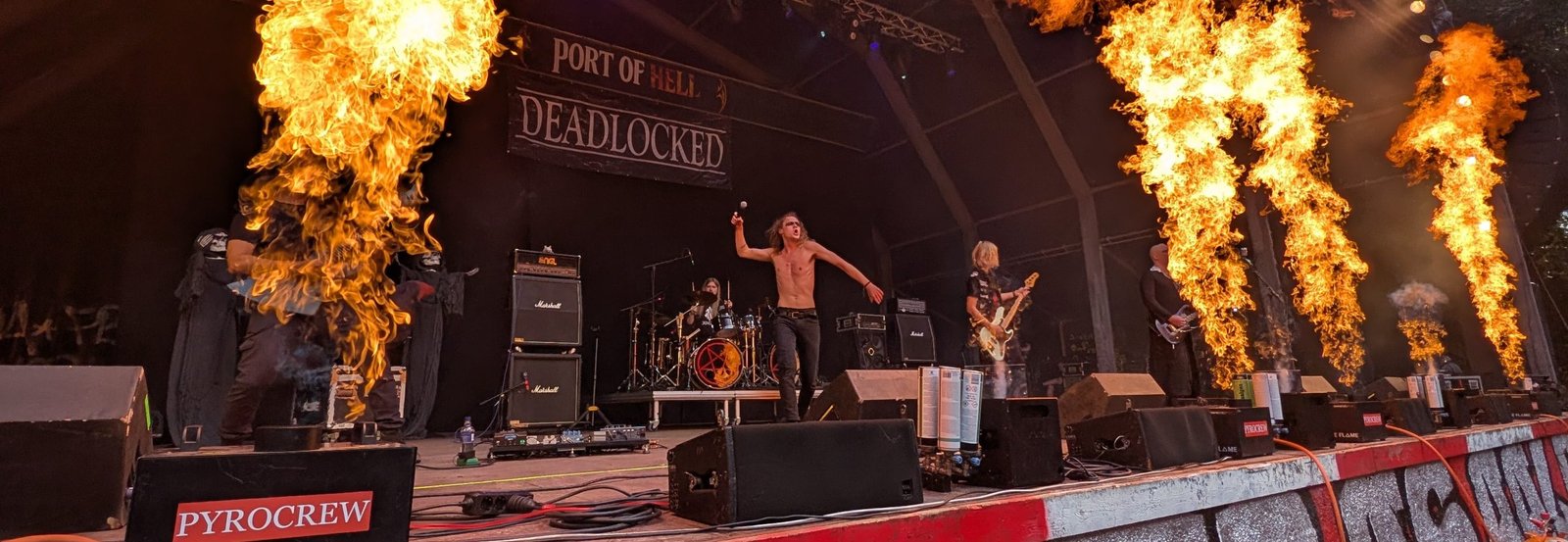 DEADLOCKED on stage at Port of Hell 2026, pyro firing across the stage